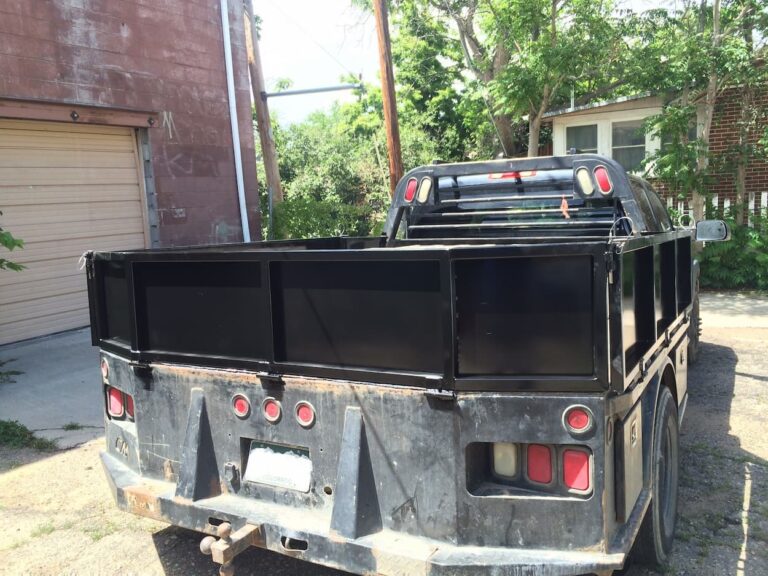 Flatbed truck with folding side.