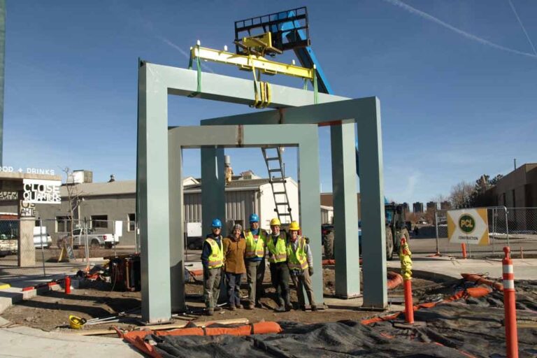 Large stainless steel sculpture under construction.