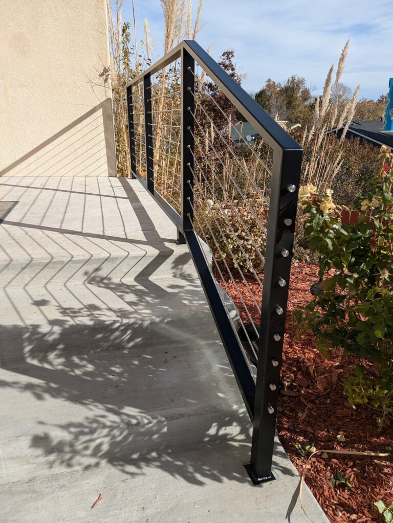 Railing with stainless steel cable infill.